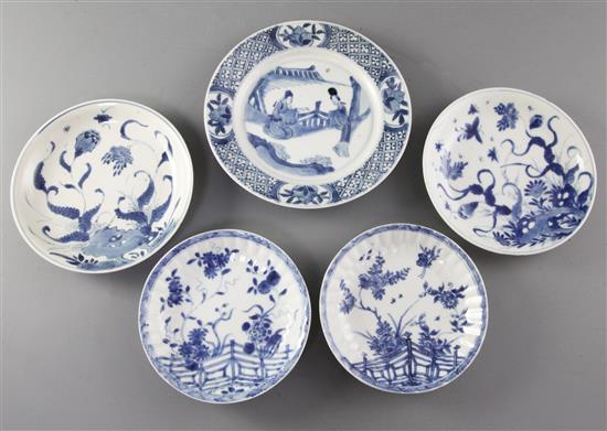 Four Chinese blue and white saucer dishes, and a similar plate, Kangxi period, (5)